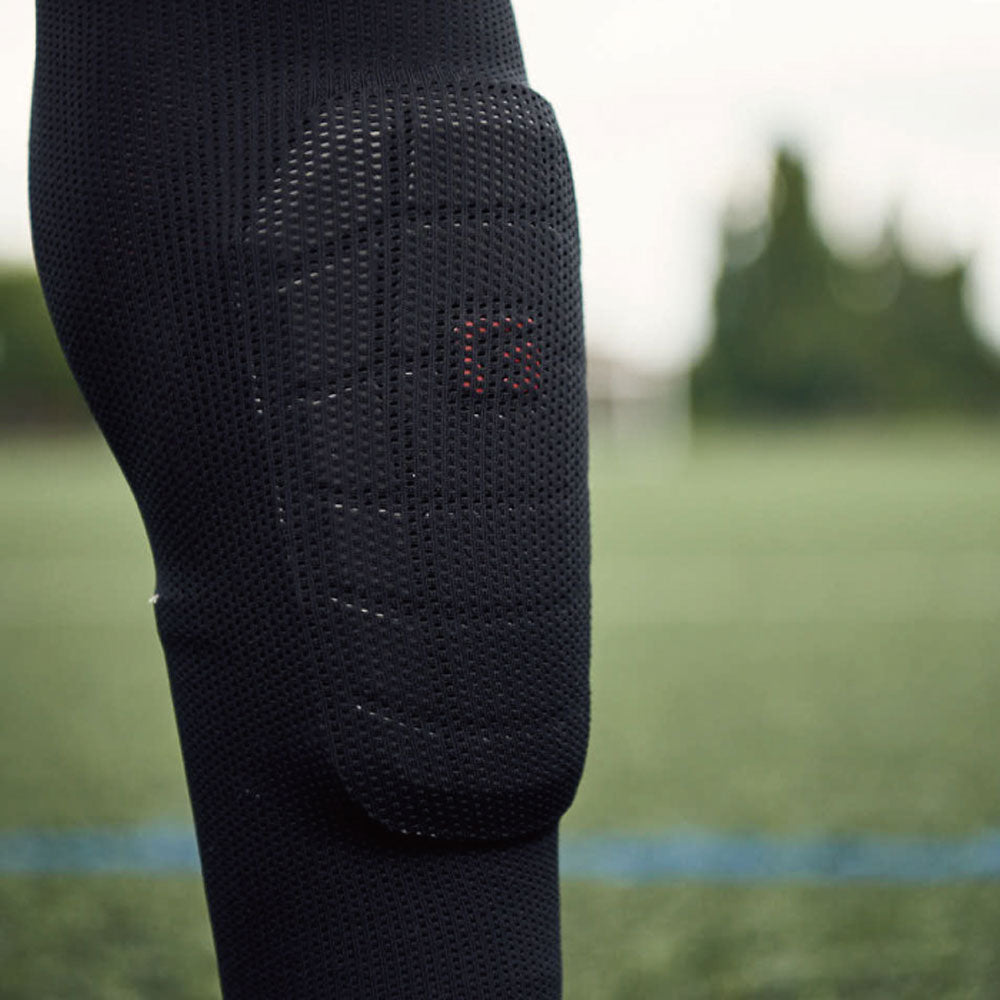 Shin guard retention sleeve