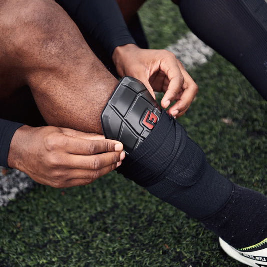 Shin guard retention sleeve